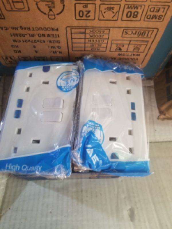White Electrical Wall Sockets with Integrated Switches