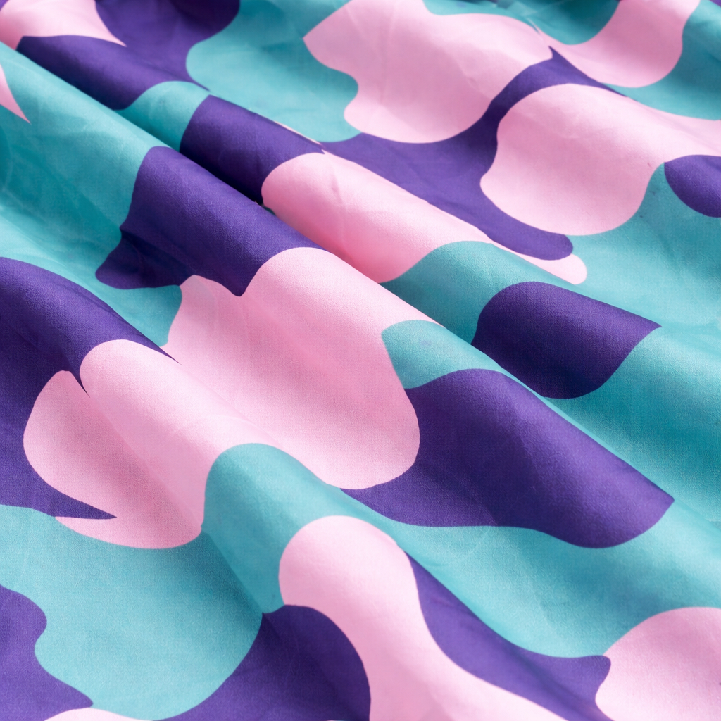 Abstract Pattern Printed Fabric in teal and pink color