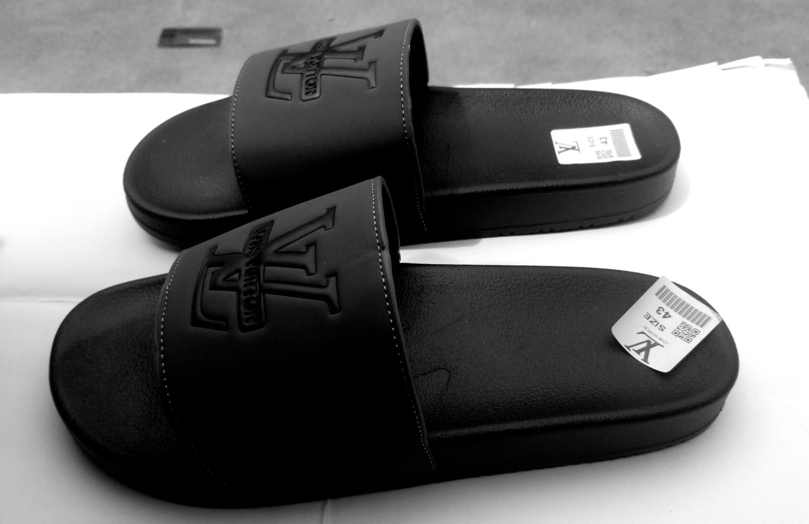 Louis Vuitton Slide Sandals with Embossed Logo Design
