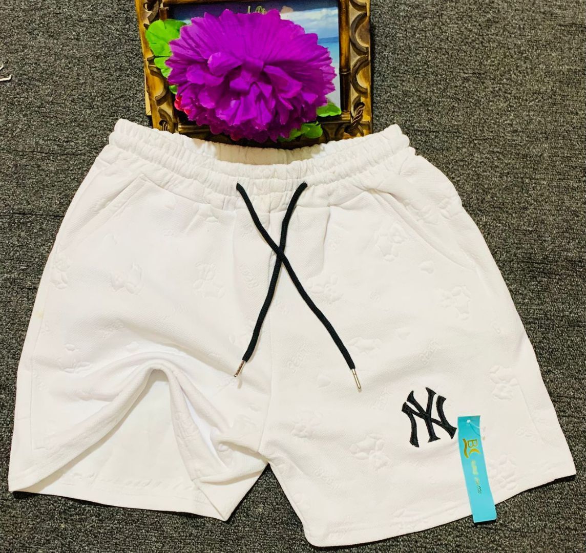 Stylish White Casual Shorts with Embossed Pattern