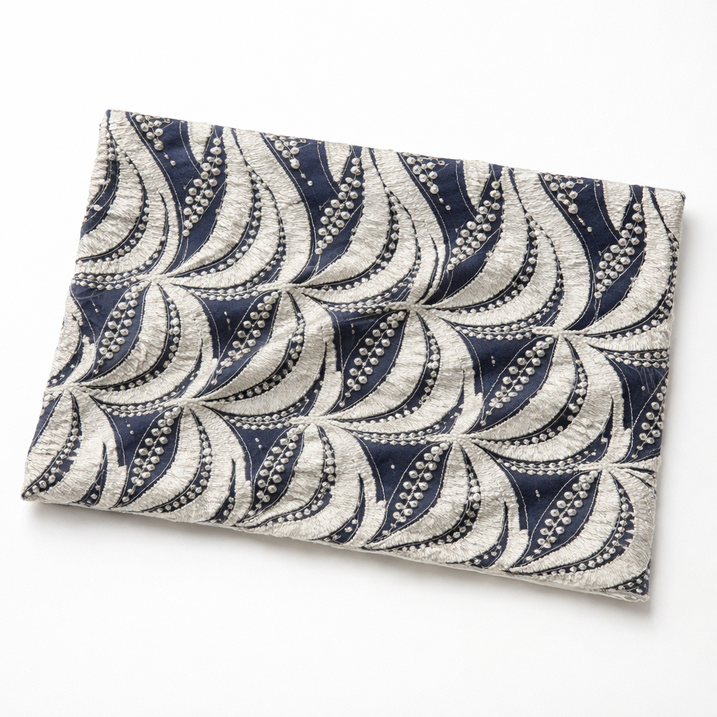 Luxury silver and navy embroidered and beaded lace fabric