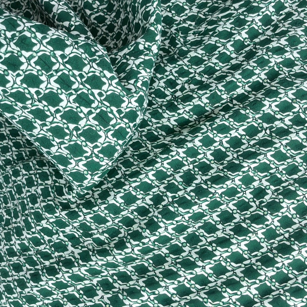 Green and White Patterned Fabric